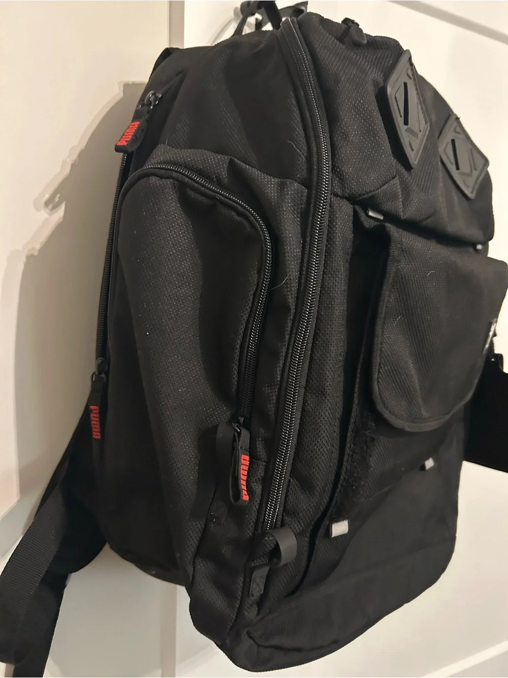 Puma Black Backpack with Red Accent Zippers